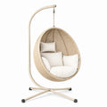 Poltrona sospesa in rattan sintetico e acciaio con cuscini in poliestere beige